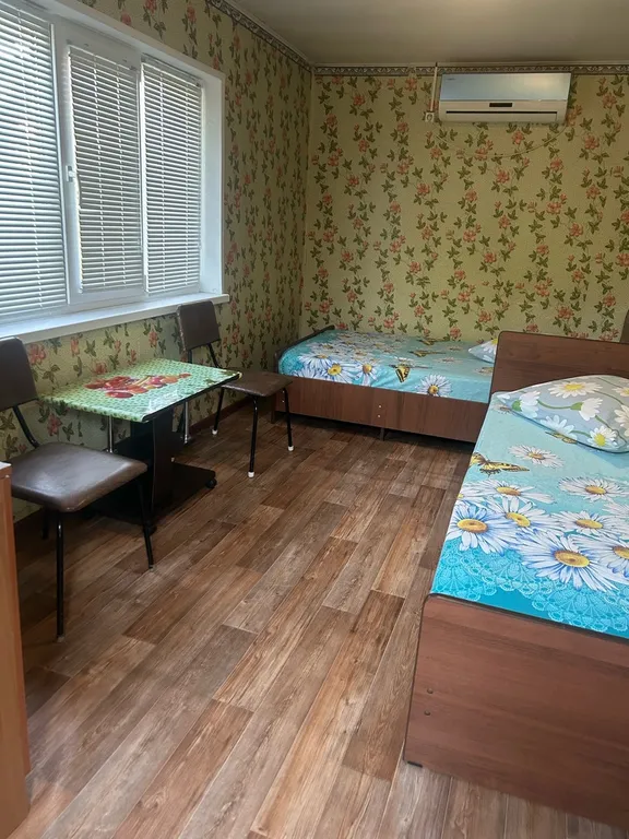 Уютная комната в тени винограда