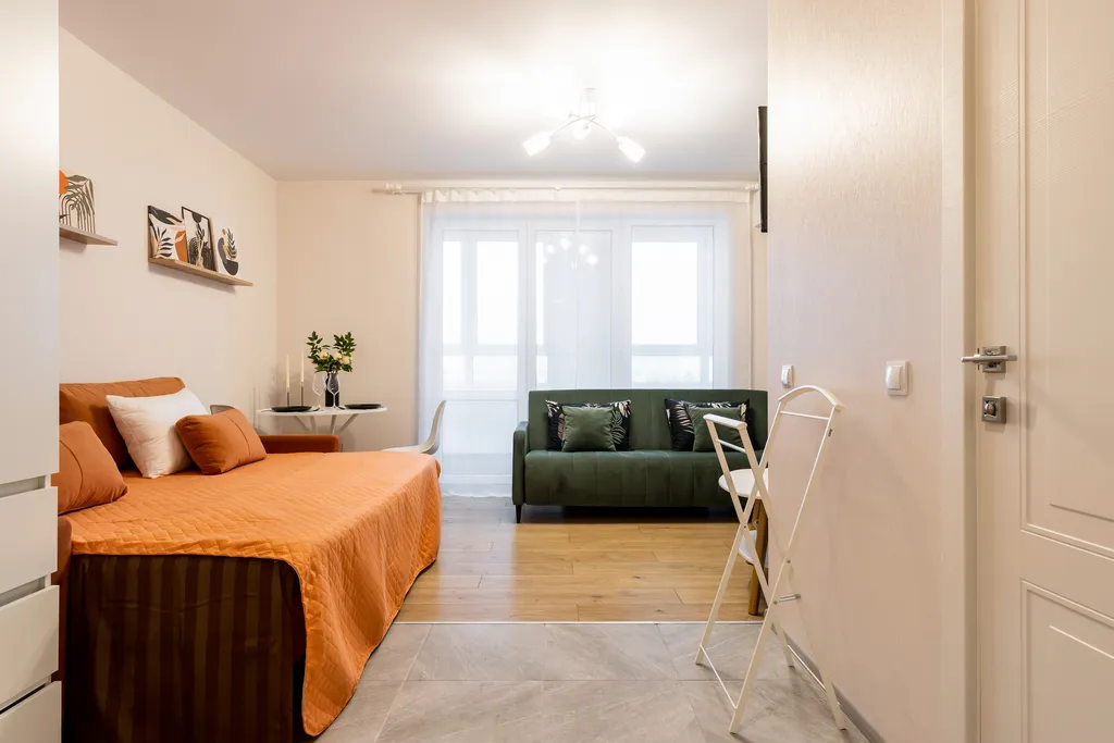 Студия Горизонты Нижнего Оранжево-изумрудный