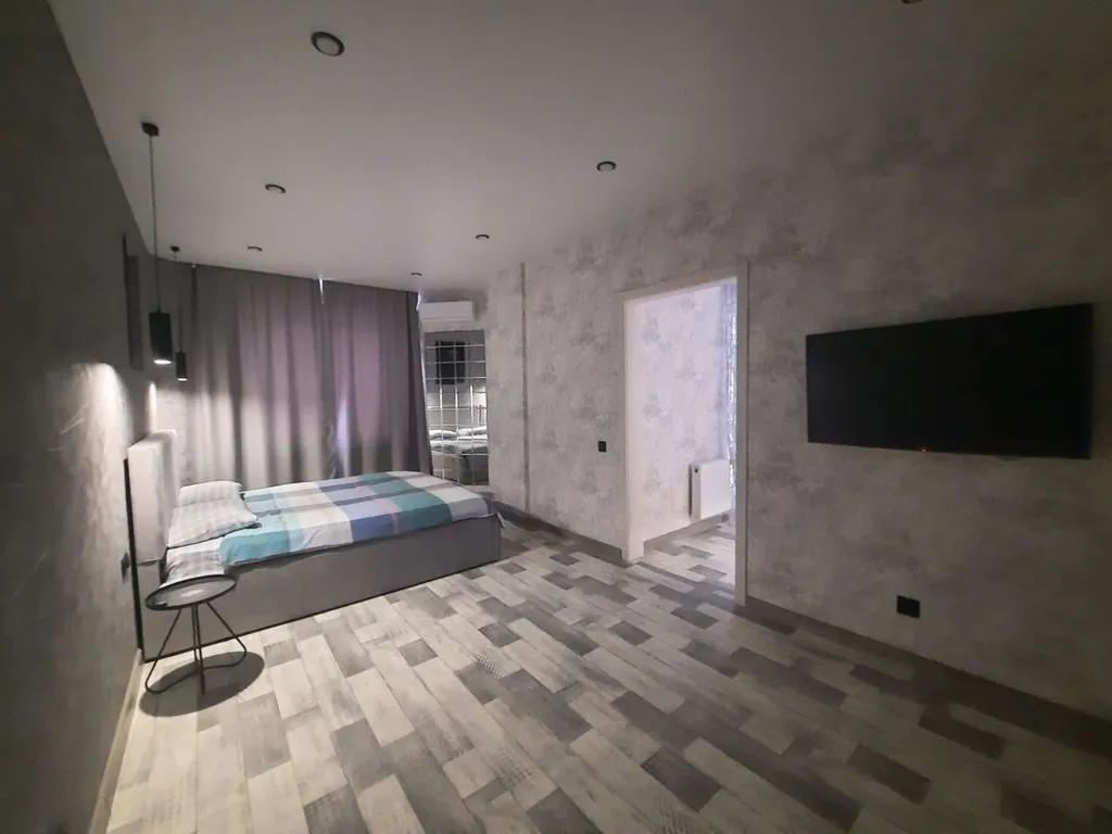 Уютная студия с видом на город