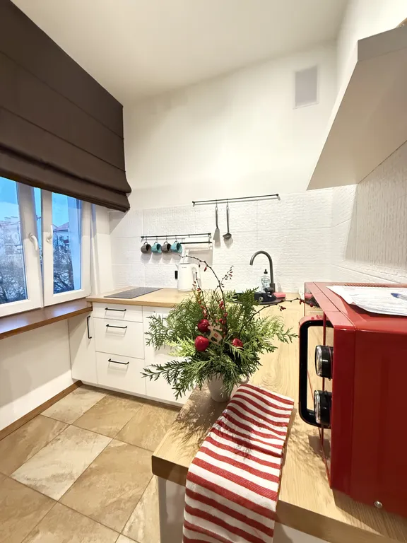 Студия Wood на булыжной мостовой от Mascaron Apartments