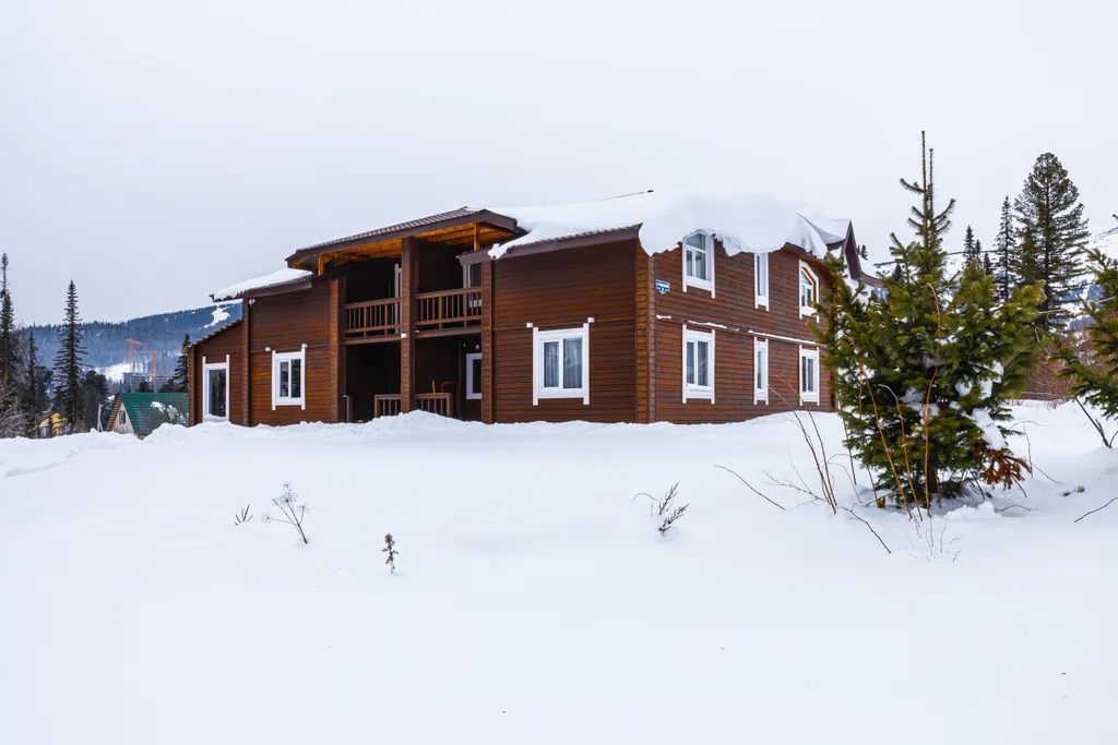 Уютный и просторный коттедж в стиле Шале