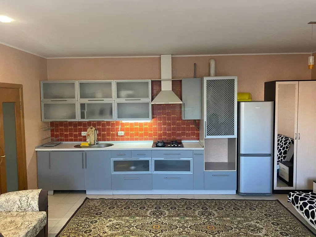 Комната-студия с кухней в частном доме