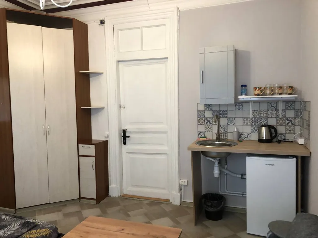 Четырехместный номер с кухонной зоной в центре