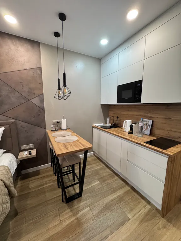 Стильные апартаменты с балконом