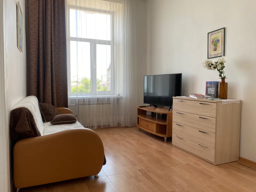 Светлая квартира в самом сердце города в историческом здании