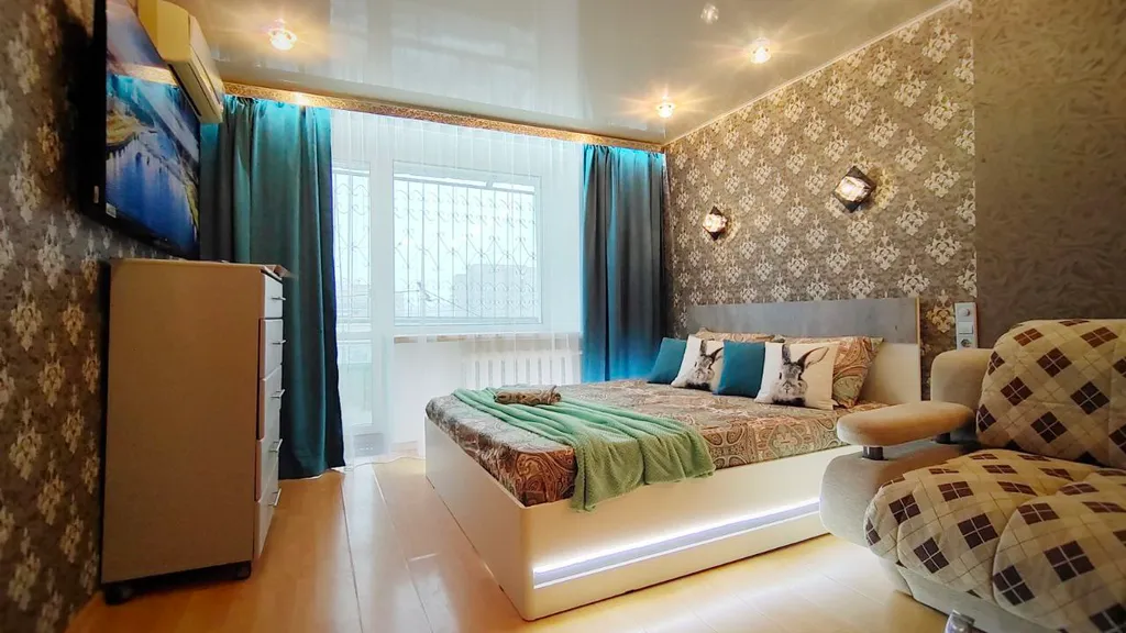 Уютная квартира у набережной и колеса обозрения