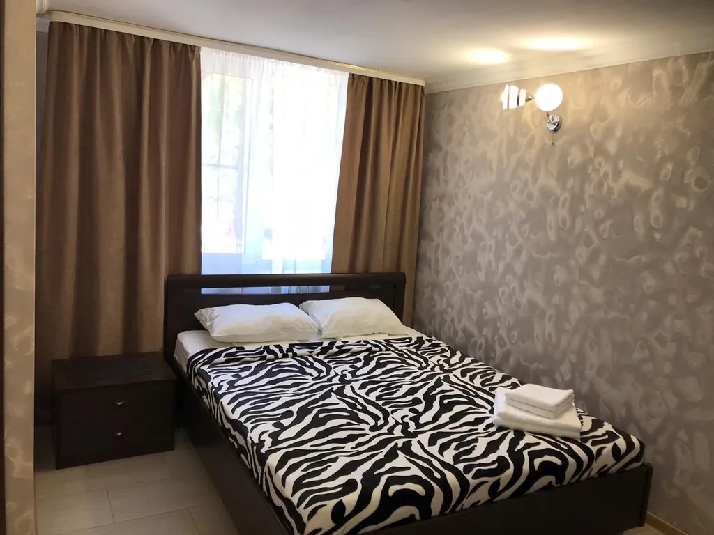 Четырёхместный люкс c двумя двуспальными кроватями