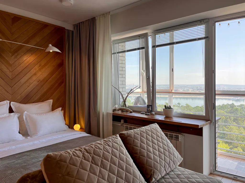 Уютнейшая студия с шикарным видом на панораму города и реку