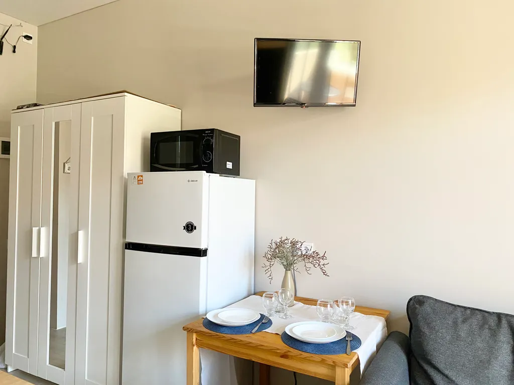 Студия с кухней бассейном у пляжа