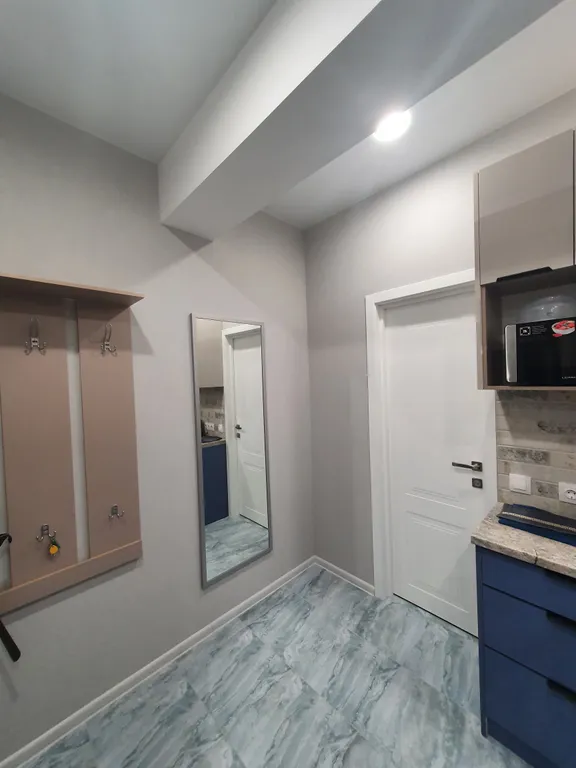 Современная студия в новом доме с видом на море