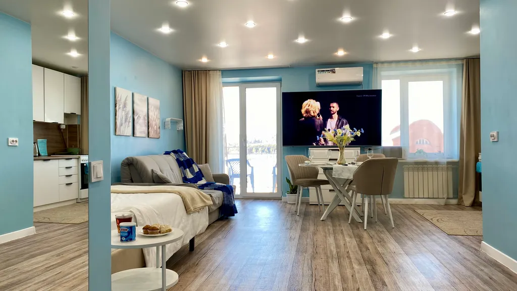 Ваш оазис спокойствия с видом на реку и горы в центре городской жизни