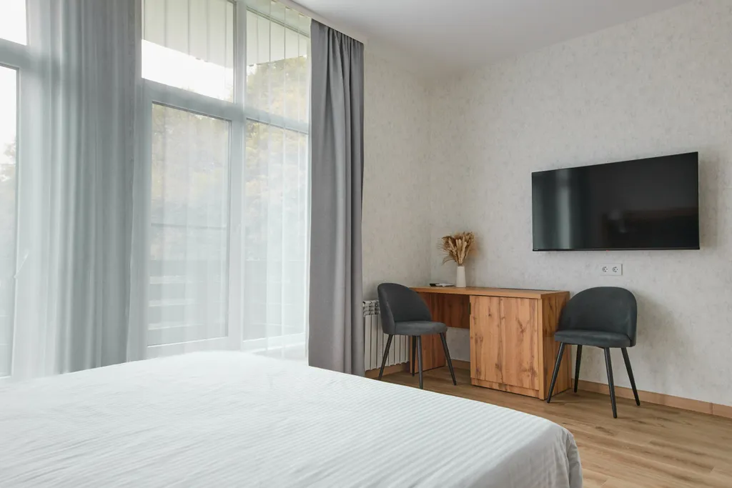 Панорамный двухместный апартамент комфорт с кухней и балконом