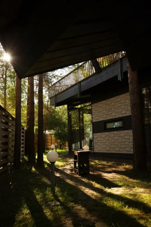 Дизайнерский коттедж с садом на крыше