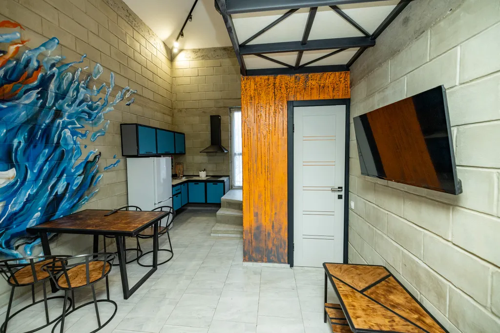 Двуxурoвнeвая студия с сауной Oгонь-Вода