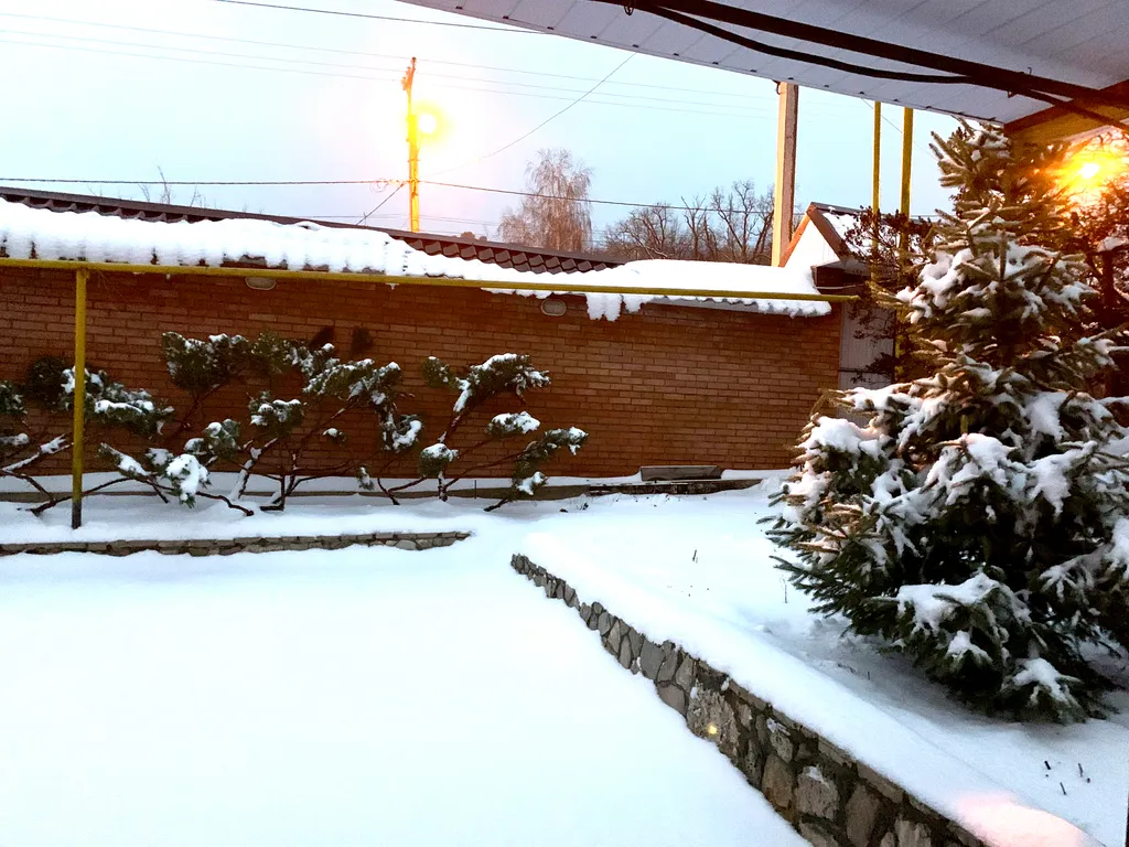 Уютный дом с можжевельником