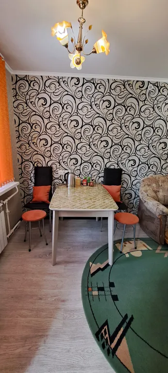 Уютная трехкомнатная квартира с обеденной зоной и двумя спальнями