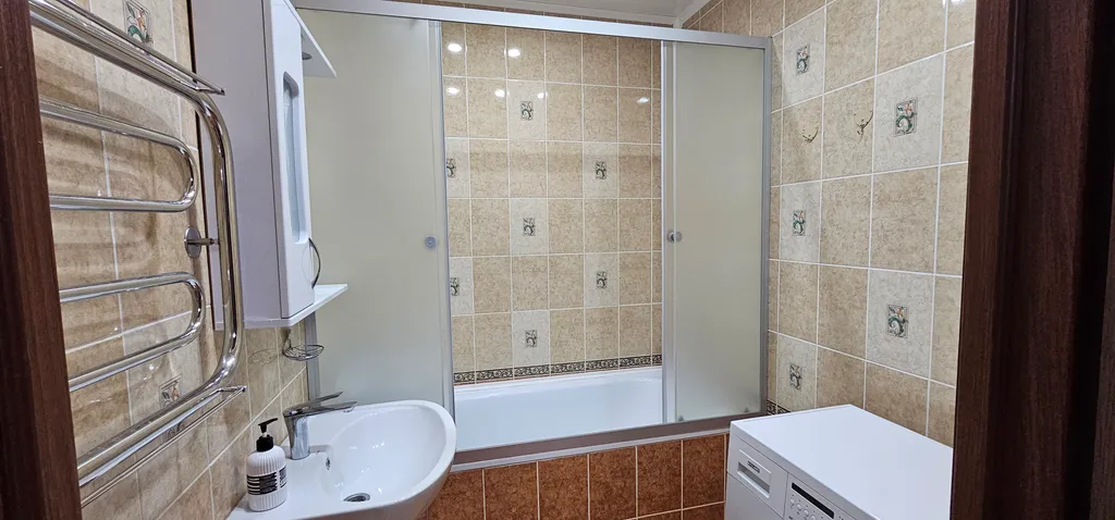 Современные трехкомнатные апартаменты на 14 этаже