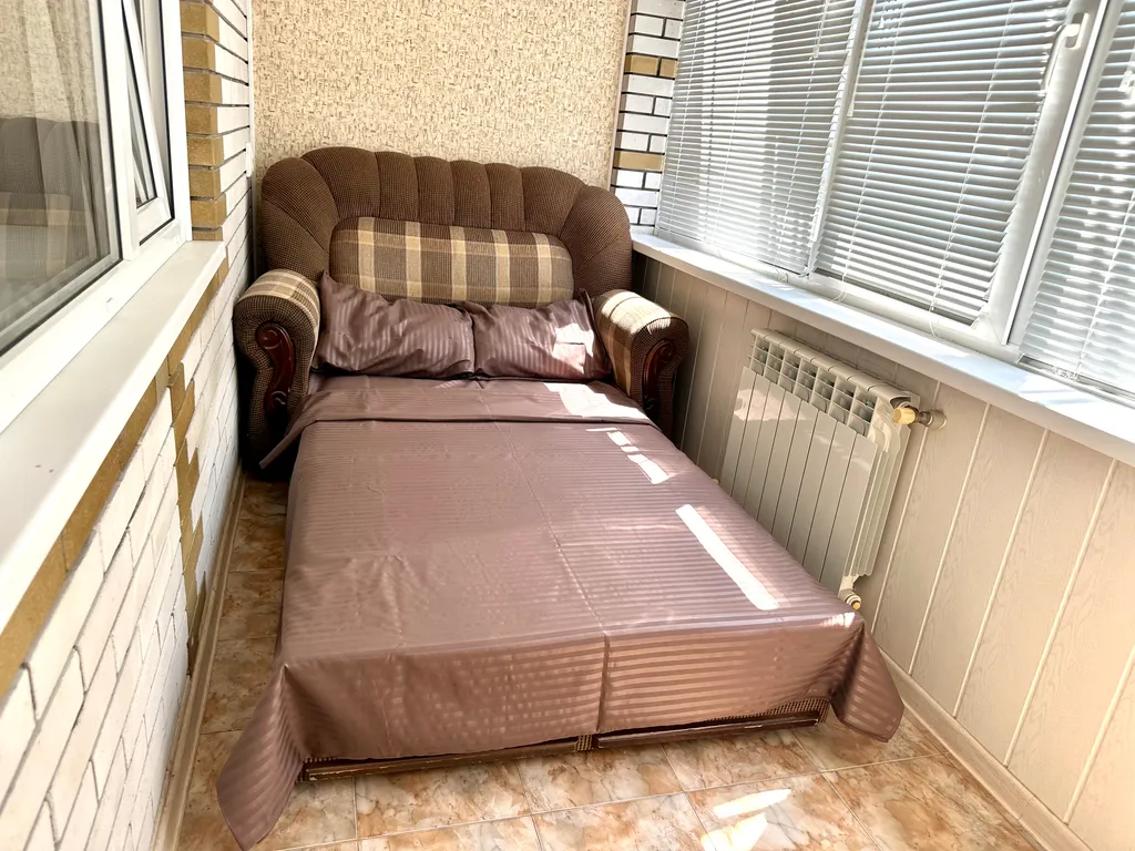 Номер с кухней и ванной комнатой в мини-гостинице со двором