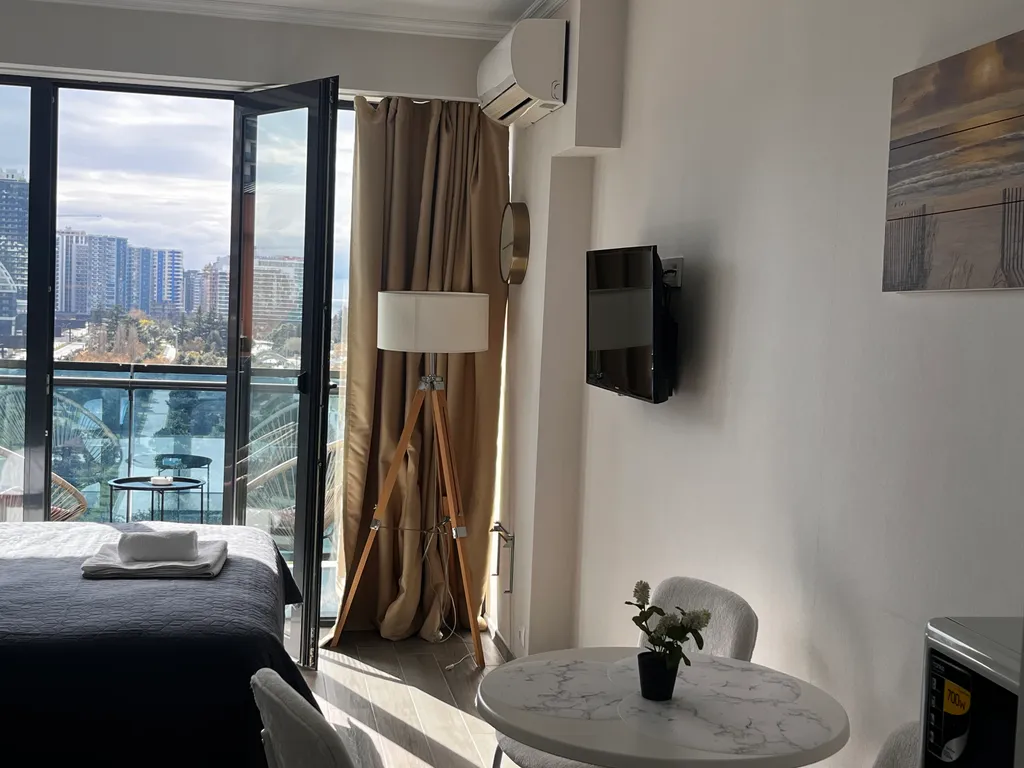 Квартира с видом на закаты и зеленый парк Orbi Beach Tower