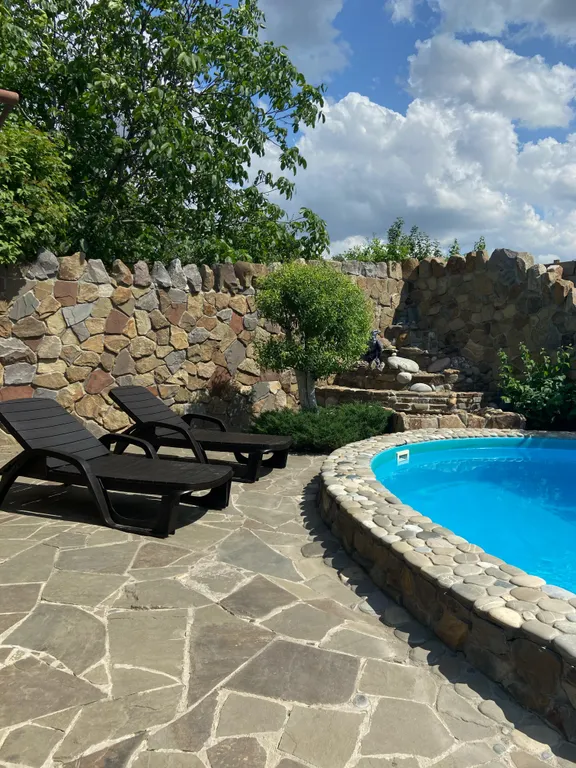 Загородный дом с баней и теплым бассейном