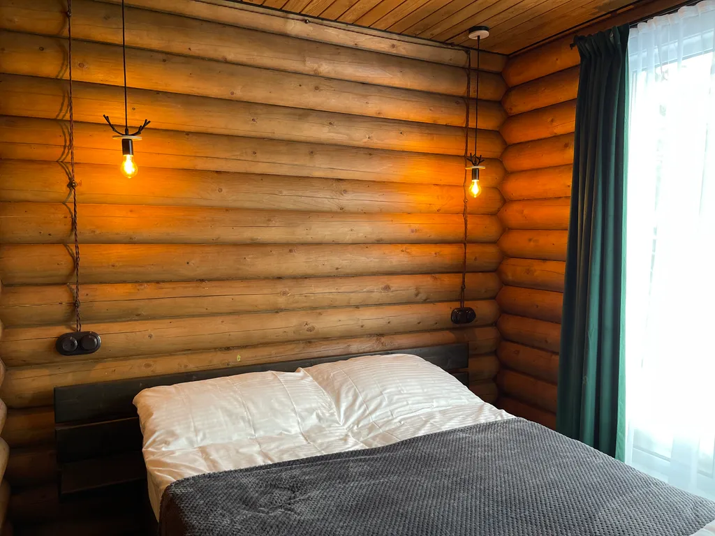 Комфортабельный дом из бревна с 2мя спальнями