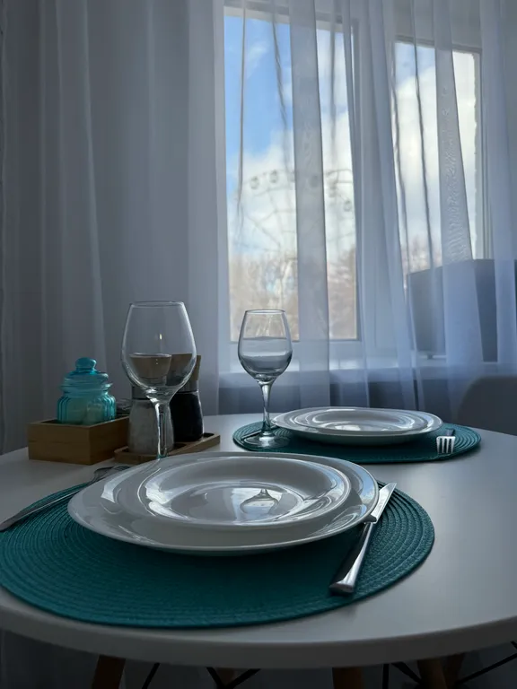 Стильная квартира с видом на колесо Обозрения