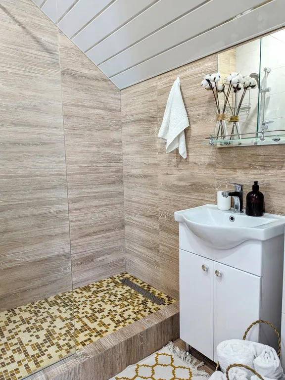 Роскошные двухуровневые апартаменты с панорамным видом на горы