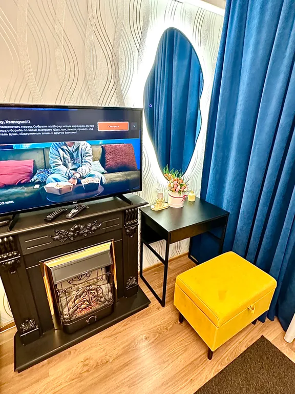 Студия с камином и кондиционером