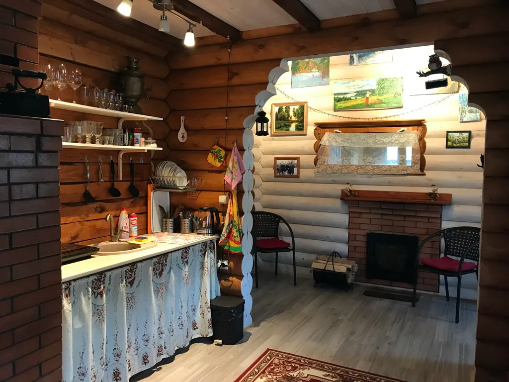 Дом из бревна Терем с сауной в черте города