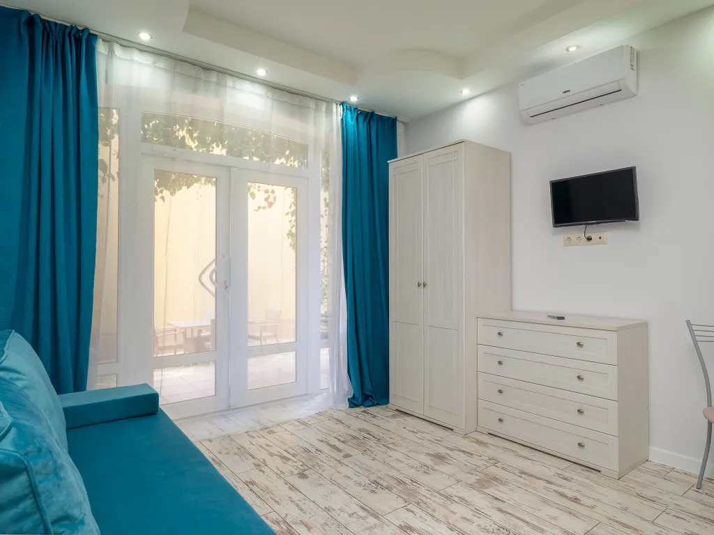 Квартира Квартира Уютная студия у моря с теплым бассейном — Сириус