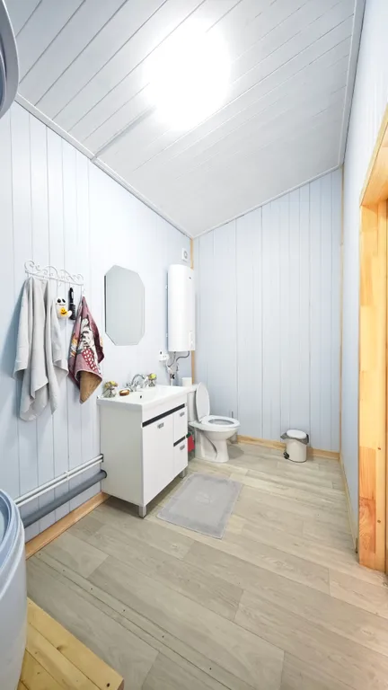 Дом у реки на закрытой охраняемой территории комплекса Гранд Ольгино