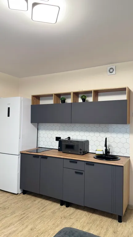 Стильная квартира-студия в новом доме микрорайона Парковый