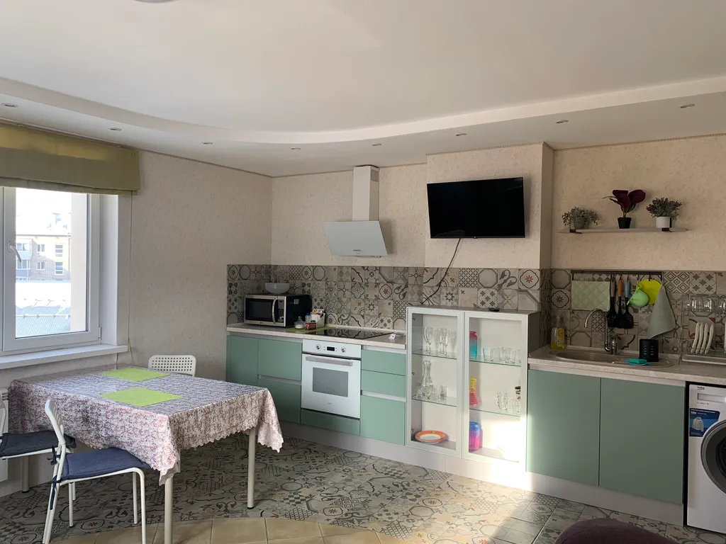 Уютная квартира с отдельной спальней и кухней-студией