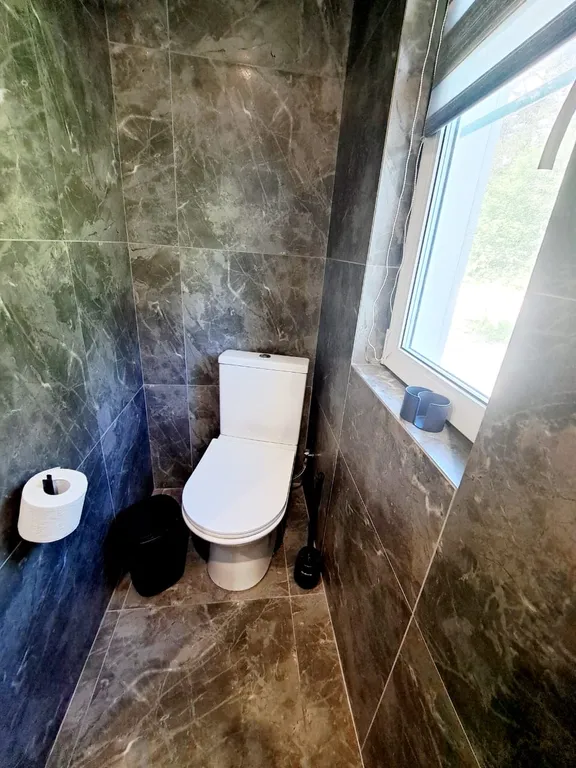 Новый современный дом с сауной и террасой