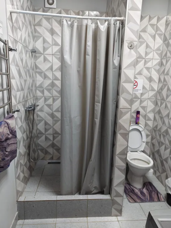 Семиместный номер с общей ванной комнатой