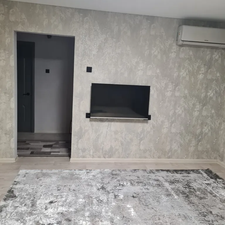 Уютная квартира в центре города рядом с парком Семья