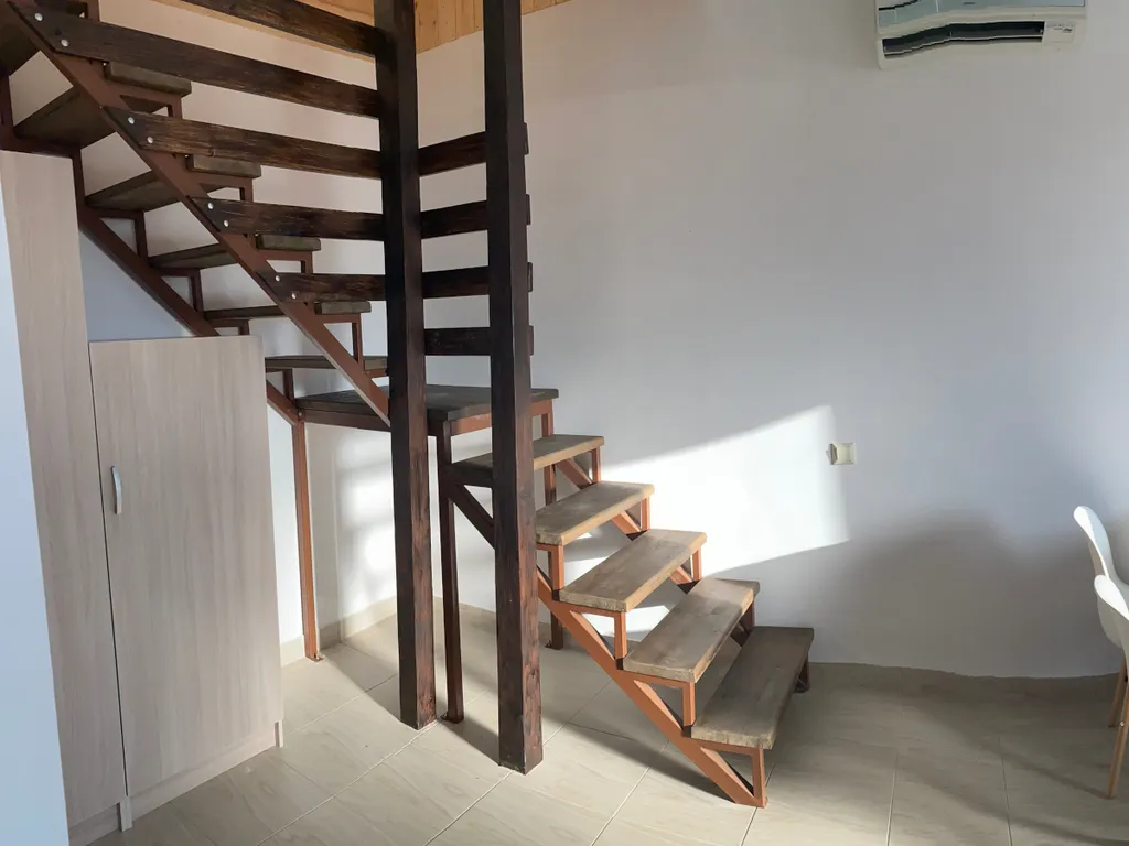 Двухэтажная дача с мансардой