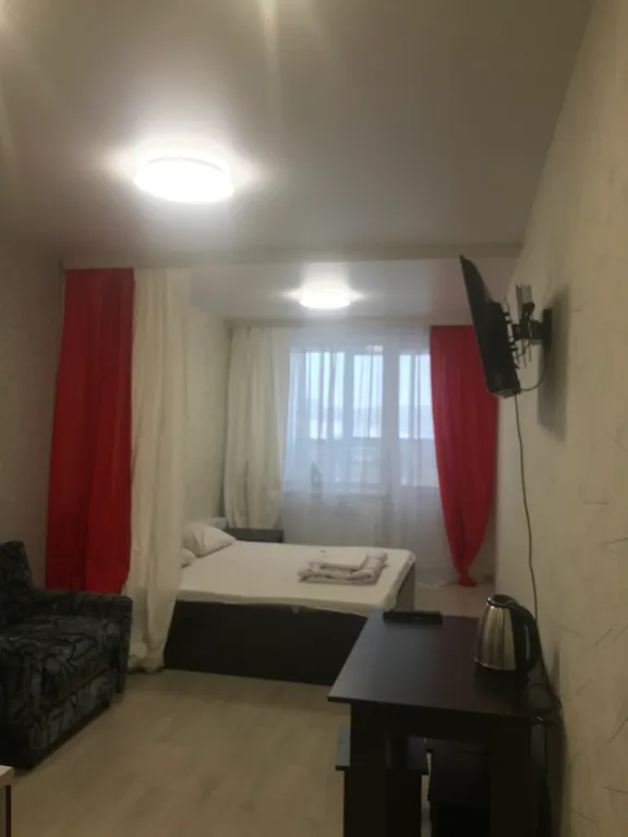 Уютная студия на высоком этаже