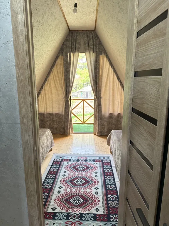 Уютный домик в горах в стиле А-фрейм