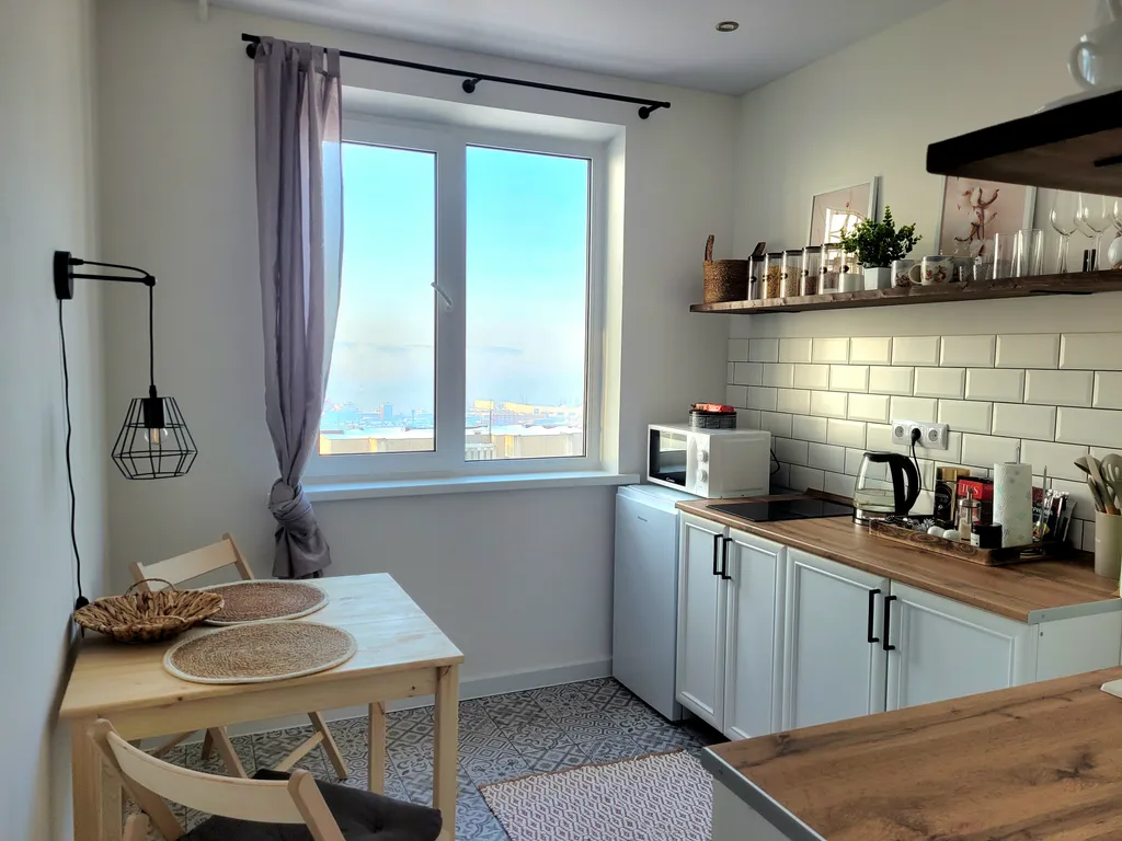 Уютная квартира с панорамным видом на город и Кольский залив