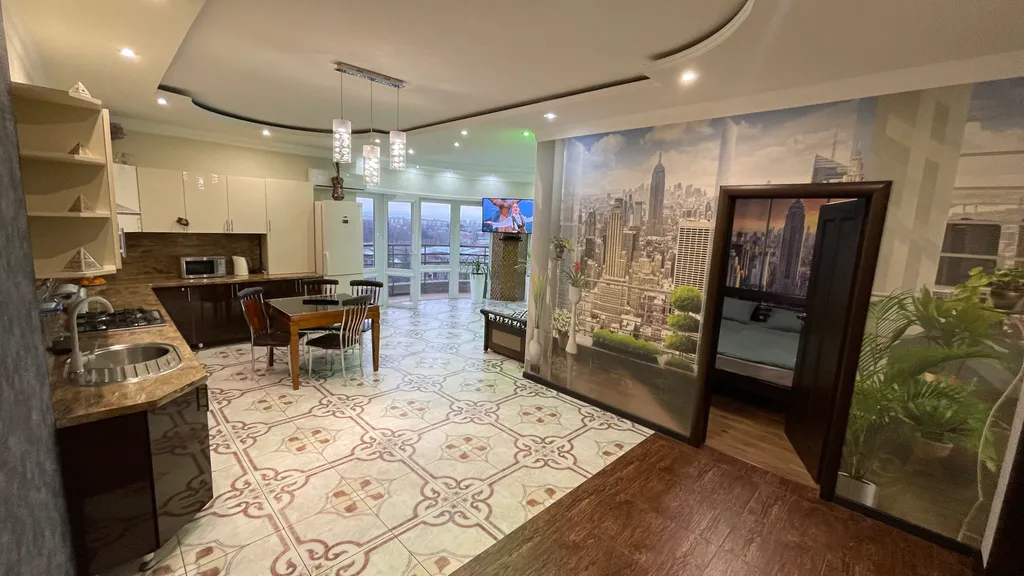 Уютная квартира с видом на город и горы