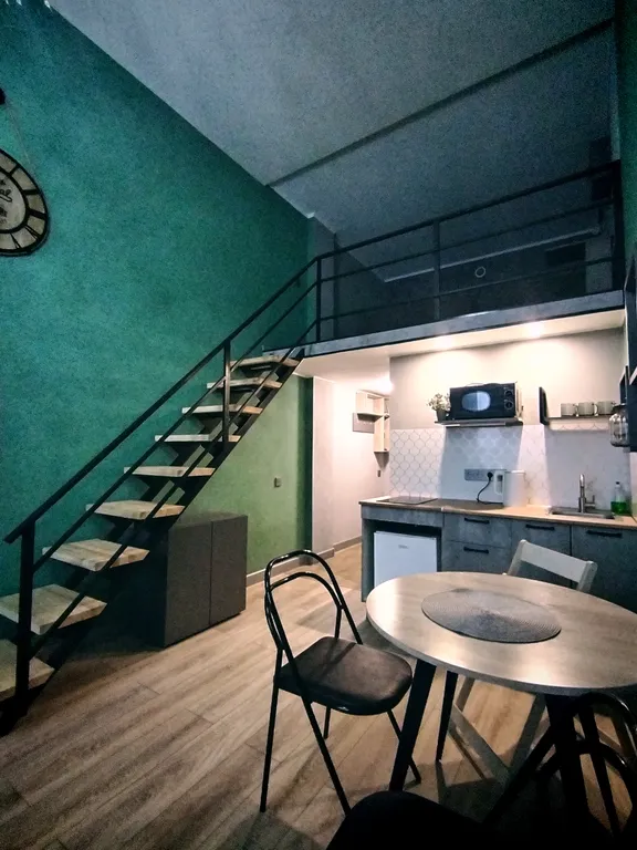 Уютная двухуровневая студия