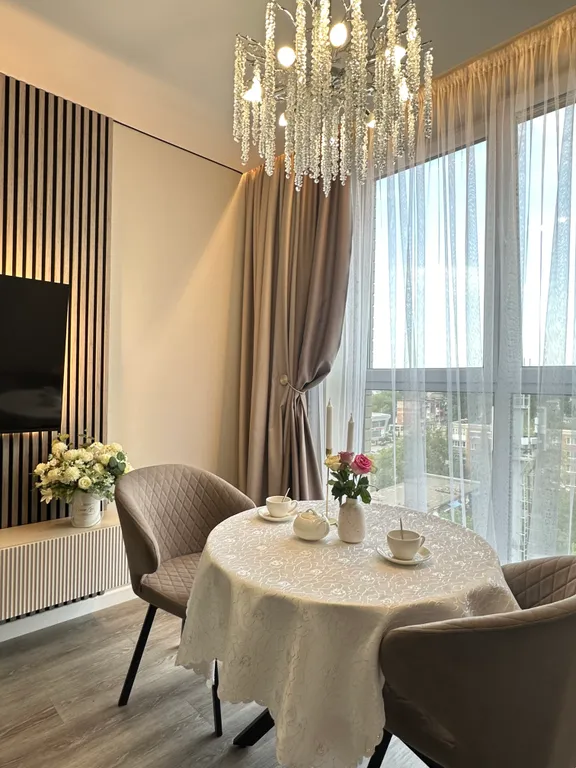 Уютная квартира в новом комплексе с дизайнерским ремонтом