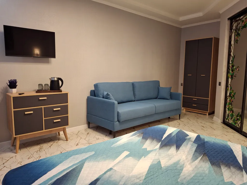 Большой четырёхместный люкс с выходом на бассейн 16