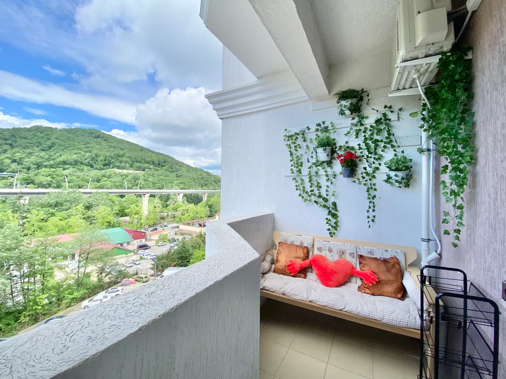 Квартира Квартира Уютная студия с панорамными окнами, балконом, видом на горы — Мацеста