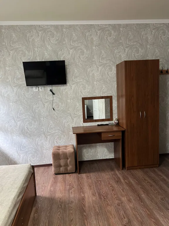 Трехместный номер с балконом и кухней