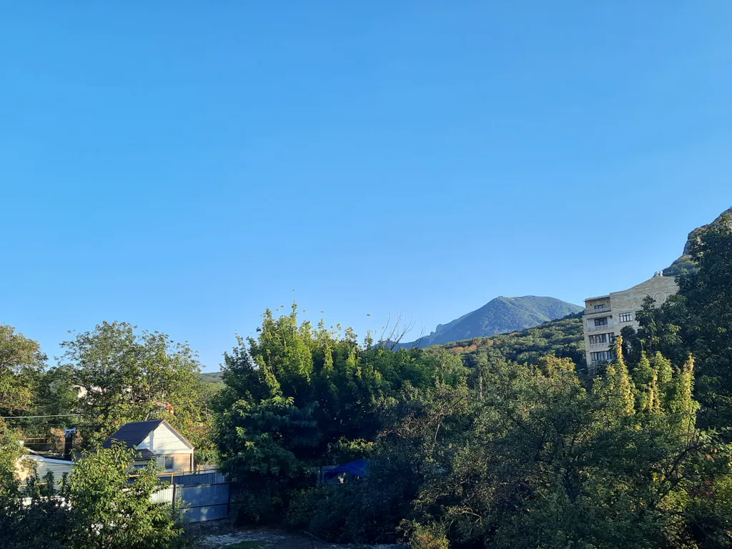 Уютная квартира в центре города с видом на горы