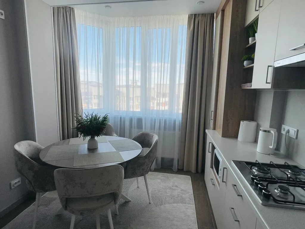 Уютная квартира в тихом районе с развитой инфраструктурой.