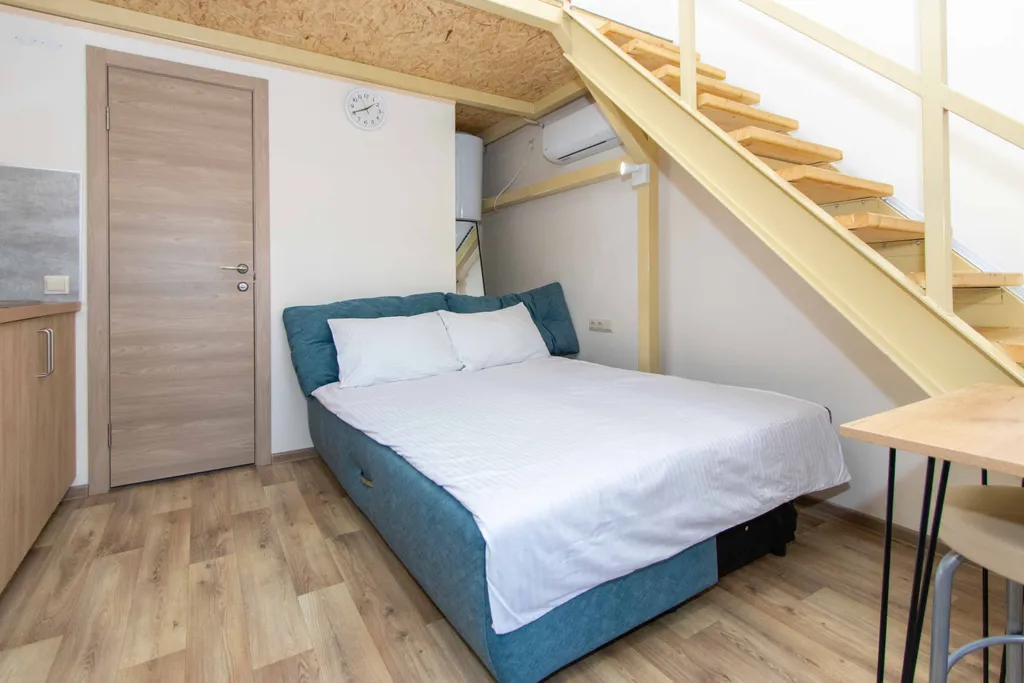 Четырёхместный стандарт с  широкими кроватями на двух уровнях