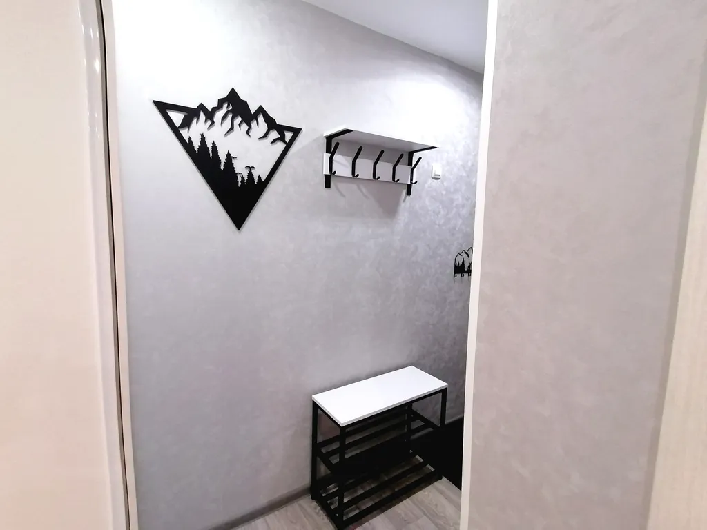 Уютная и тёплая квартира в центре города. Столовая расположена  в доме